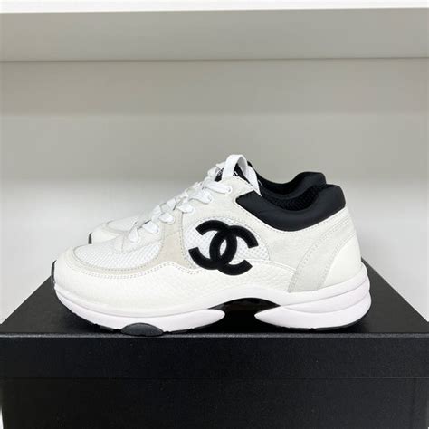 chanel cc logo sneaker black|Chanel logo sign.